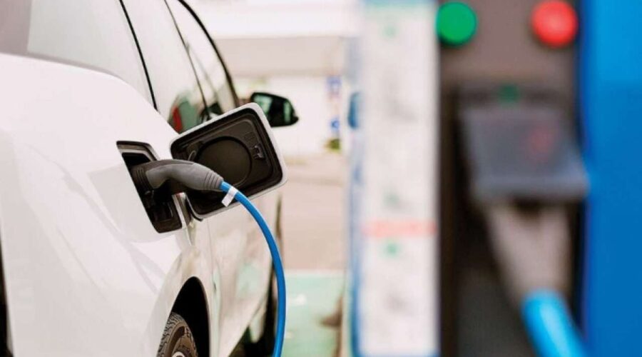 Why do governments give tax credits for electric vehicles?
